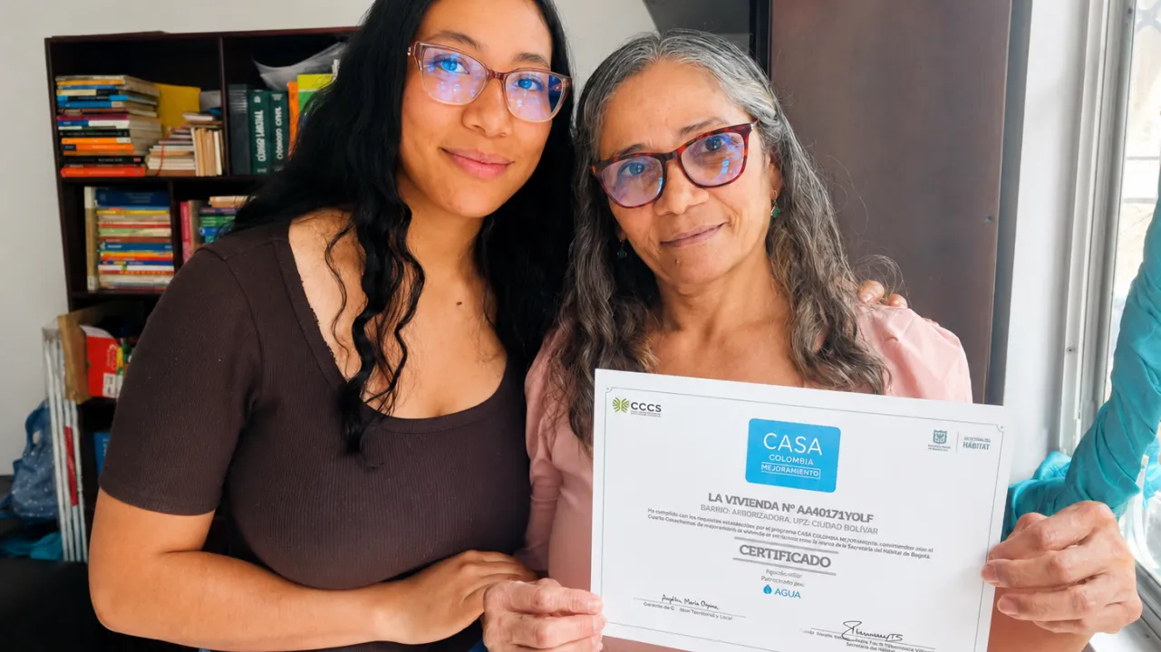 Beneficiaria de mejoramiento de vivienda