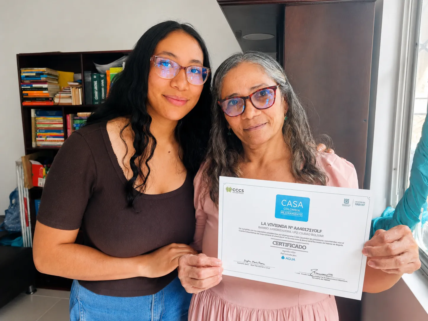 Beneficiaria de mejoramiento de vivienda